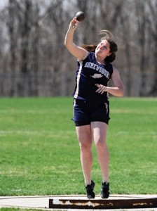 Shrewsbury High School's Kesley Shea lets her shot put go; Shea tossed it 31 feet 1 inch to help her team place second to Marlborough in the event.