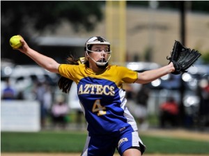 Assabet Valley Regional Technical High School's Madison Parmeter winds up to deliver a pitch.  Parmeter pitched the entire game, giving up two runs on five hits.