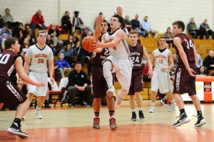 Marlborough High School's Owen Cappadona makes his move against Groton Dunstable Regional High School's Daniel Howes.