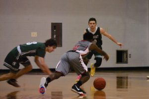 Hudson boys’ basketball upsets Oakmont for first win of season