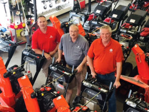 Rick Simonovitch, Garrett Baker and Peter Fenlason, salesmen at Boston Lawnmower Company, pose with some of the Ariens Snow Thrower lineup. Photo/submitted