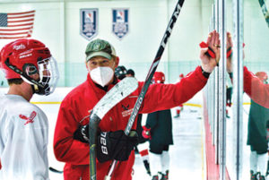 Hudson High School ice hockey coach Mike Nanartowich