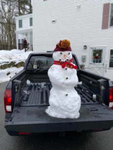 The snowman survived the trip home to Hausmann's driveway.