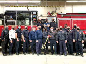 Captain/EMT Stephen L. Krysa (middle, wearing blue mask) with members of the Marlborough Fire Department Photo/courtesy Marlborough Firefighters Local 1714
