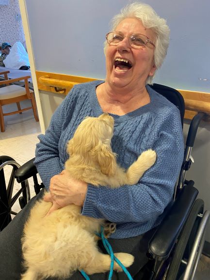 Resident Edith DeBaggis, again with puppy Gracie