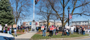 Protestors fill the Westborough Rotary March 27 for an anti-Asian hate rally.