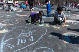 Goodnow School responds to hateful graffiti with ‘Colors of Kindness’ chalk art