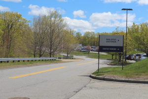After speeding concerns, high school driveway may become a public road