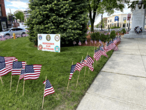 After discussion, flags and signs will be allowed in rotary to honor veterans
