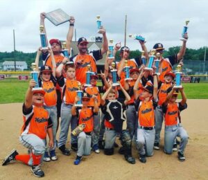 Members of Marlborough’s 9U baseball team celebrate their recent state championship.