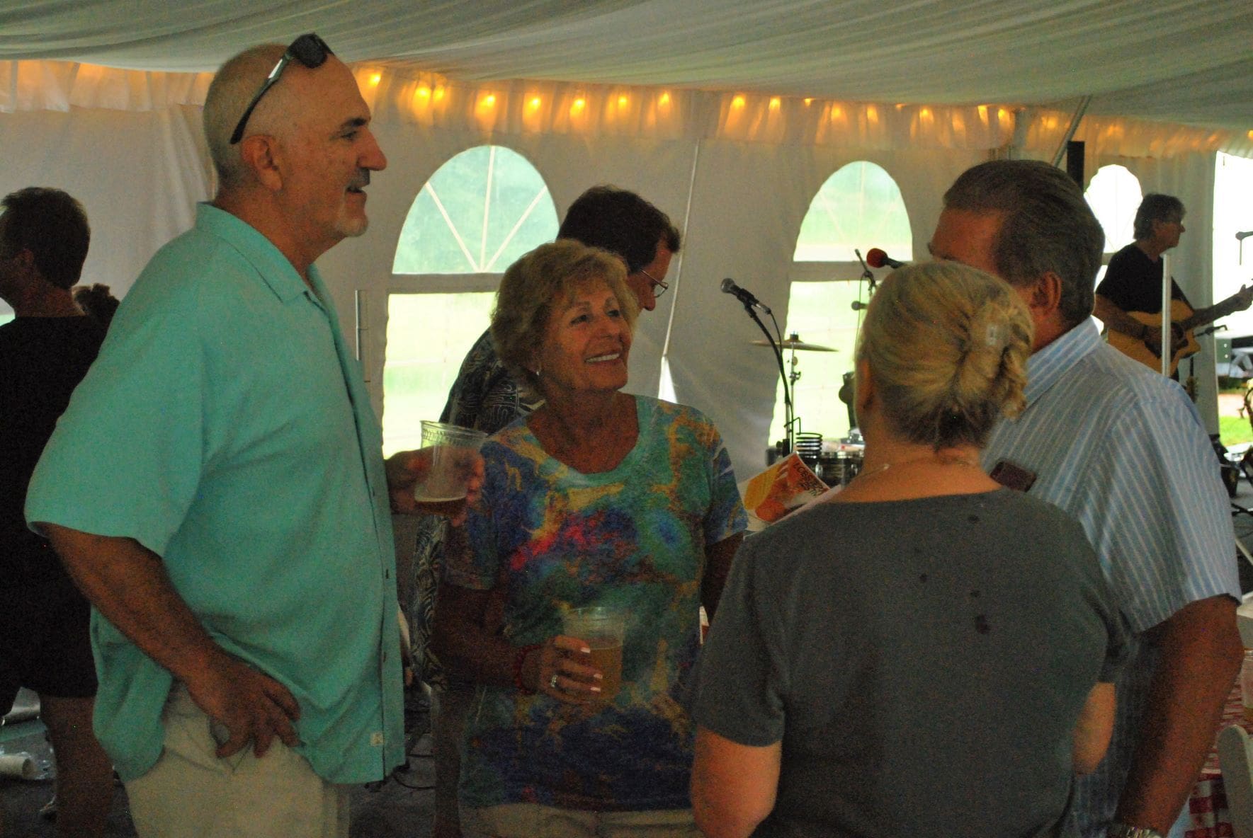 MRCC President and CEO Robert Schlacter (left) mingles during the Chamber’s Aug. 27 BBQ, Bands and Brew event. Photo/Dakota Antelman
