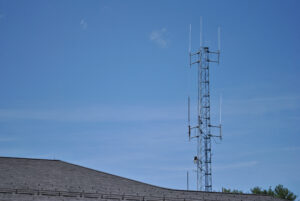 An existing antenna towers over Hudson’s Cox St. Fire Station. A major upgrade to the town’s public safety radio system is nearly complete. Photo/Dakota Antelman