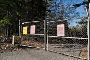 A gate marks the entrance to Hudson’s Chestnut St. Well. The town recently had to re-award its water testing contract after a previous provider told officials it would be unable to fulfil its commitment.   (Photo/Dakota Antelman)