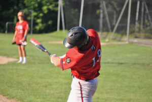 A Northborough batter swings on a pitch. (Photo/Dakota Antelman)