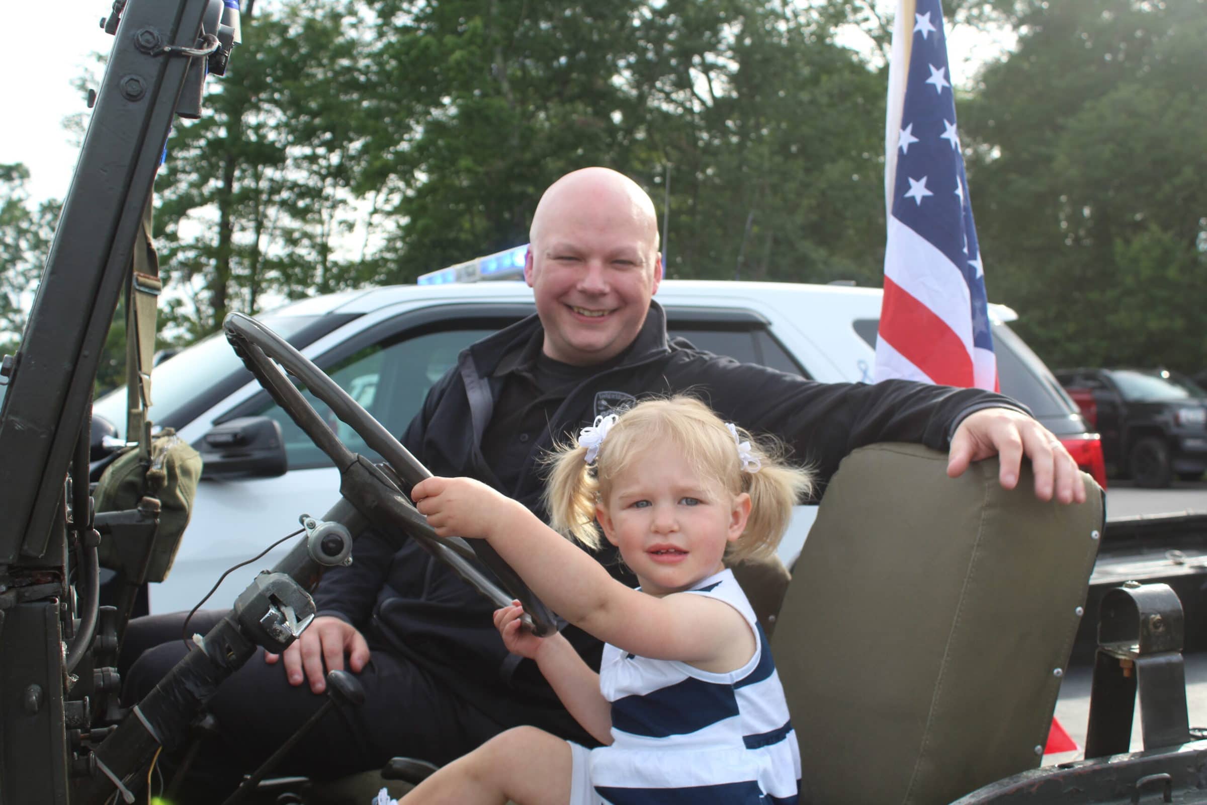Kurt White poses with Mae-ann during National Night Out.