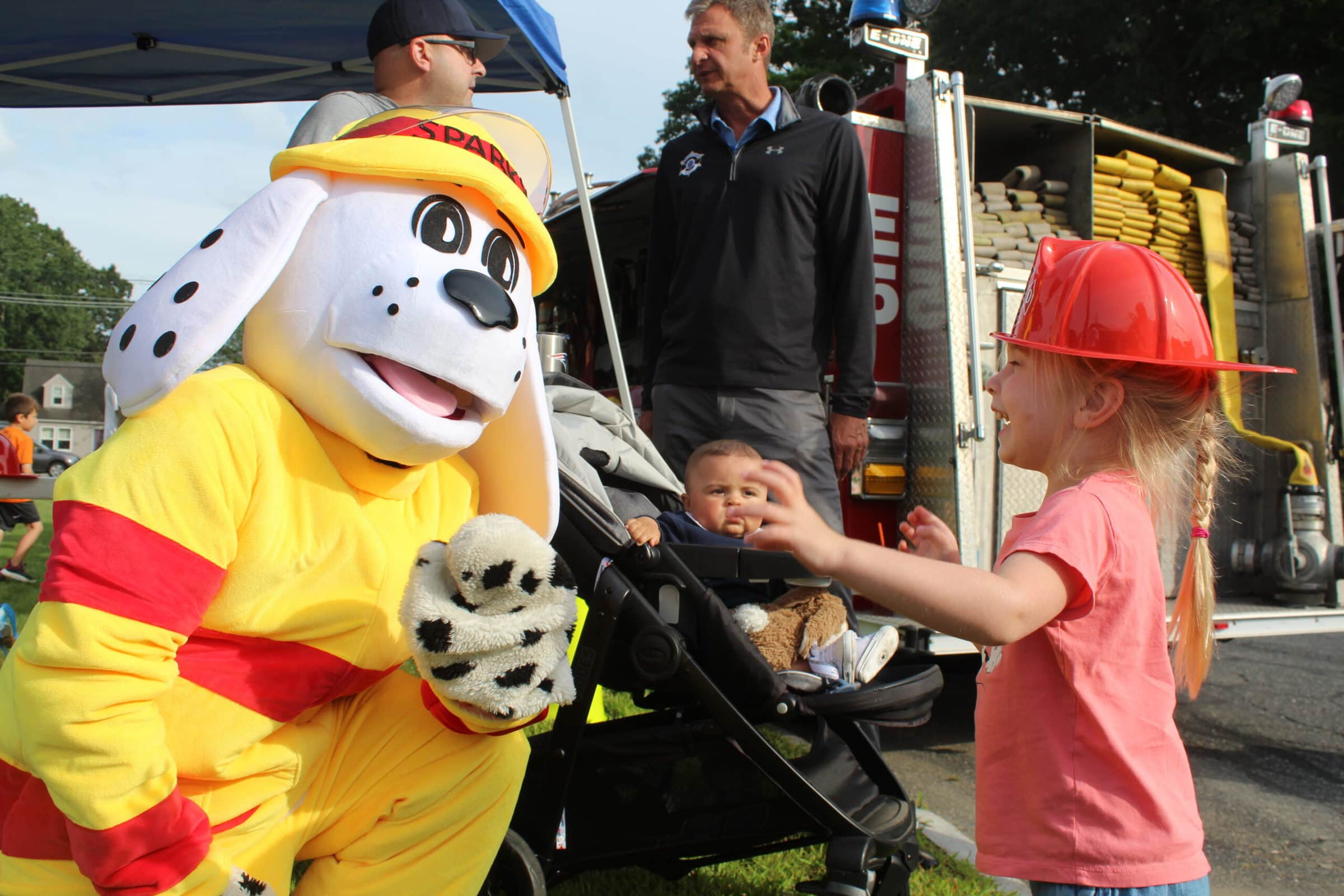 Amalia Mulcahy was excited to see Sparky the Fire Dog during National Night Out.