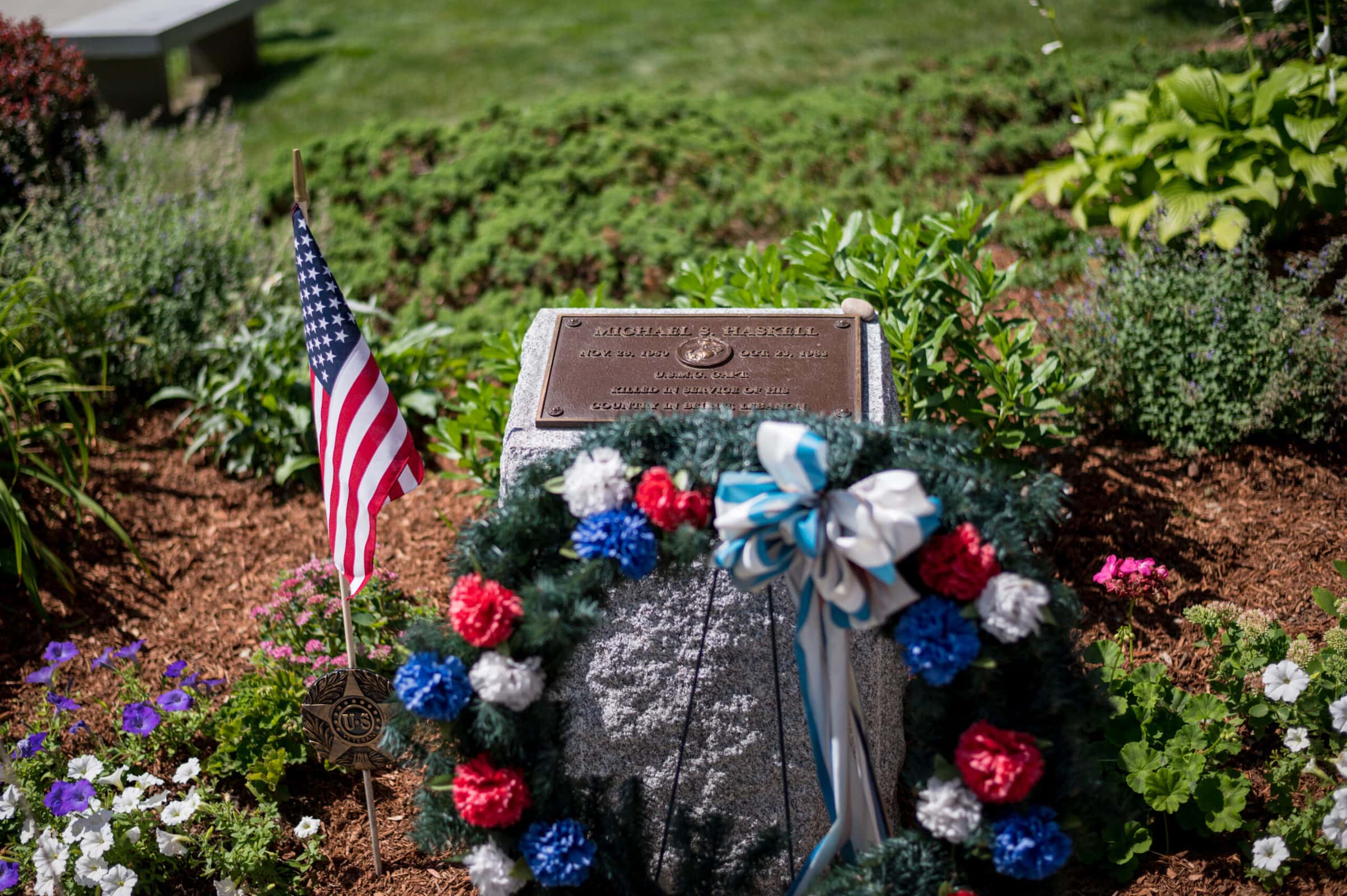 A new plaque sits atop a raised stone pedestal and honors Michael Haskell, who was killed in the 1983 bombings in Beirut, Lebanon. (Photo/Jesse Kucewicz)
