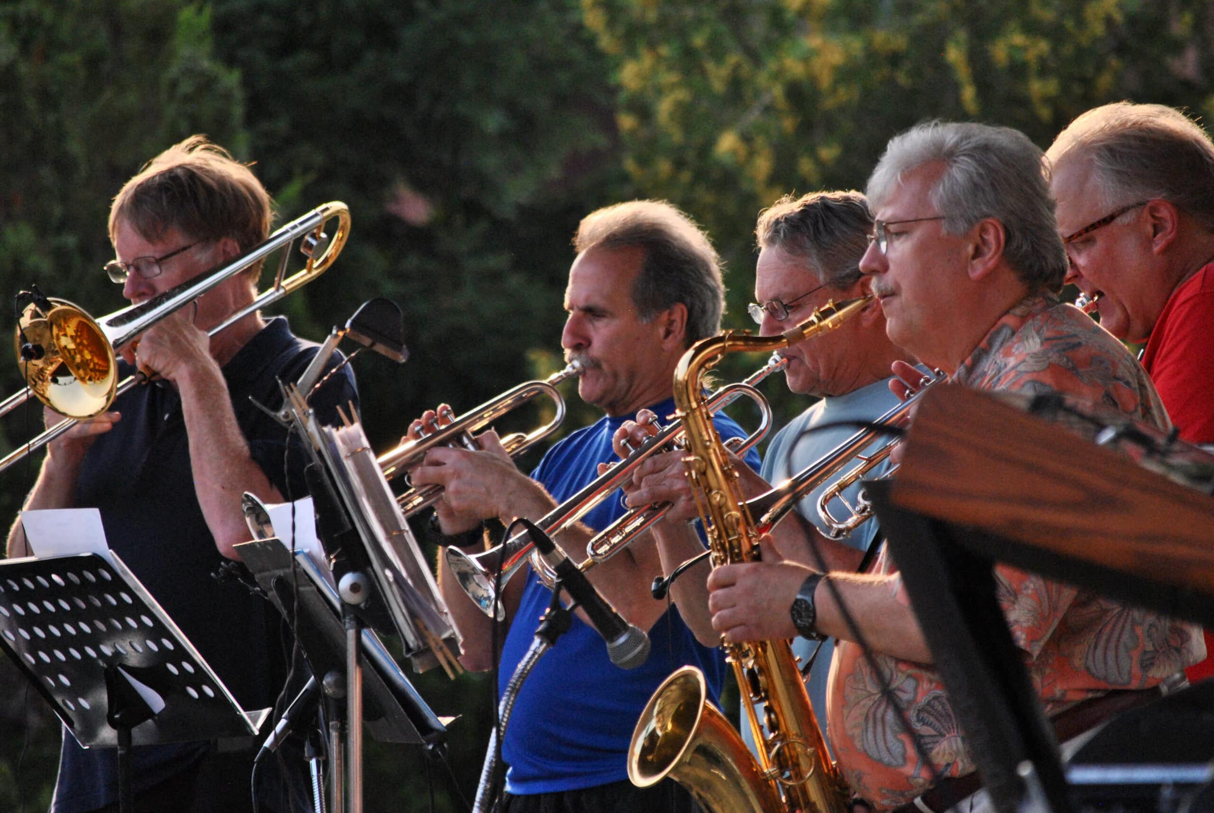 Horn players crowd on stage in Westborough’s for the Midtown Horns’ performance on Aug. 10.