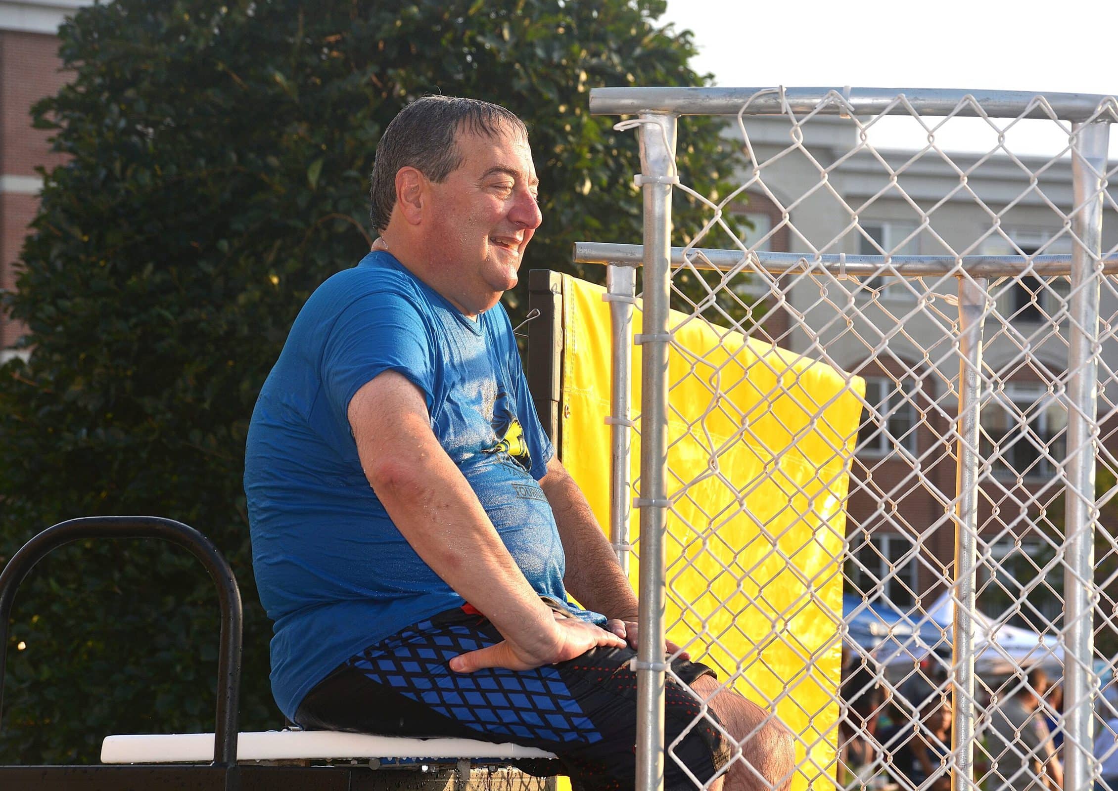 Angelo Cavalieri, past president of the Westborough Lions Club, takes the seat of the organization’s dunk tank.