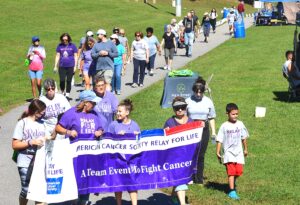 Relay for Life of Marlborough/Hudson begins with cancer survivors and caregivers walking a lap around Ward Park.