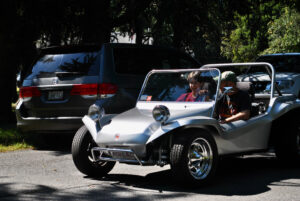 Attendees of the A&M reunion car show on Sept. 26 ride their vehicle away from the Marlborough Fish & Game Association. 