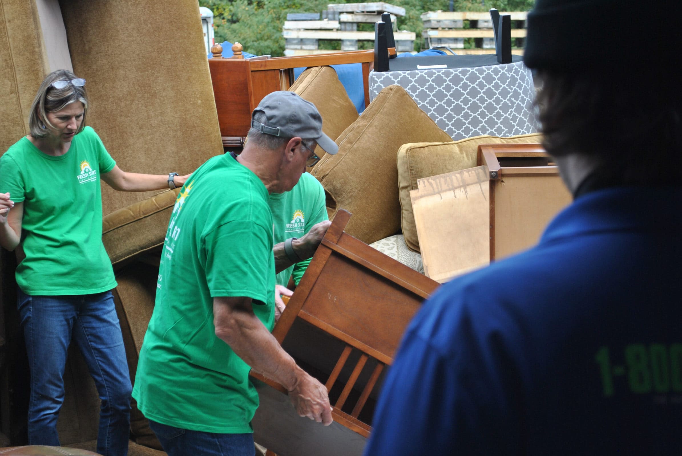 Fresh Start receives a donation of furniture. Volunteers coordinate supplies to be sent to refugee families resettling in the US.