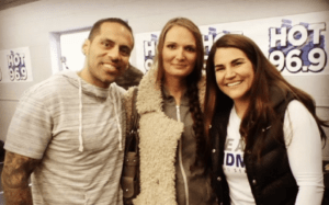 Ramiro Torres stands with his ex-wife Sandie and his wife Nicole, who is planning to run the Boston Marathon for Sandie. 