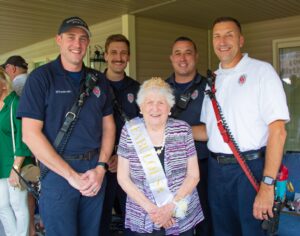  Bunny stands with members Westborough Fire Department. From left to right, those reporters are Mike Daniels, Derek Hirons, Bunny Perron, Greg Doucet, and Captain Stephen Doucet (Photo/Susan Olsen Orpilla)