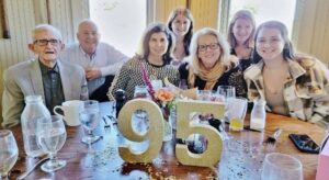 Hudson native and former Town Treasurer Dave O’Neil, far left, was honored with a family party at Gibbett Hill in Groton on his 95th birthday, by, from left: Matt O’Neil, Allene Diaz-O’Neil, Kate O’Neil, Ellen O’Neil, Lynette O’Neil and Emily O’Neil.