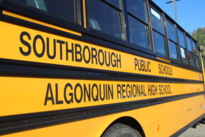 Southborough buses line up, parked at Solomon Pond Mall. The district’s bus provider has an app for parents to track their child’s bus.