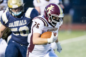 An Algonquin player charges forward during a game in the Fall II sports season earlier this year.   Photo/Jeff Slovin