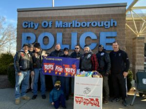 Marlborough Eagles Riders make Toys for Tots donation at police station