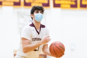 Algonquin’s Todd Brogna wears a mask during a game in last year’s winter sports season. Student athletes across the region will be back in masks this winter in accordance with state guidance. 