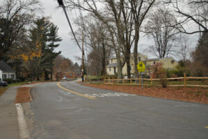 Existing signage stands of Fisher Street in Westborough near the entrance to Gibbons Middle School. 