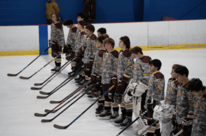 Algonquin boys hockey wears camouflage jerseys in honor of fallen soldier