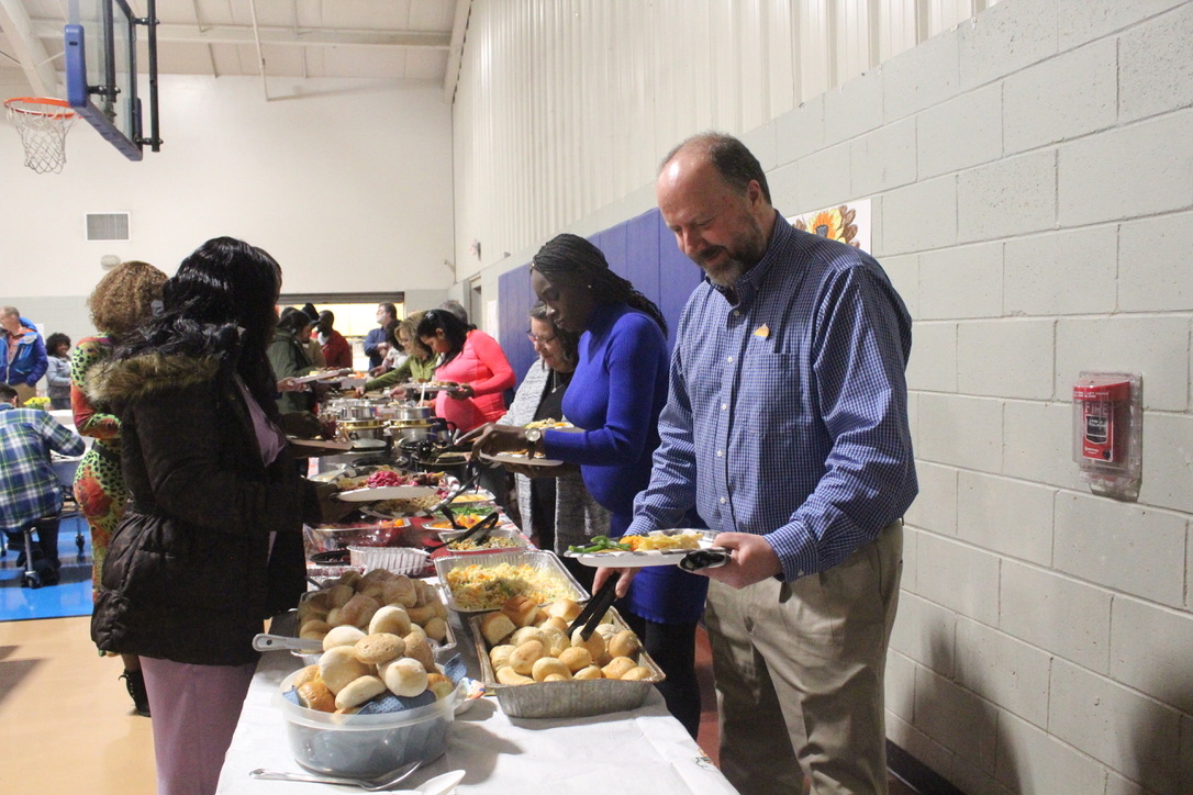 Northborough celebrates Thanksgiving with families from Haiti, Colombia