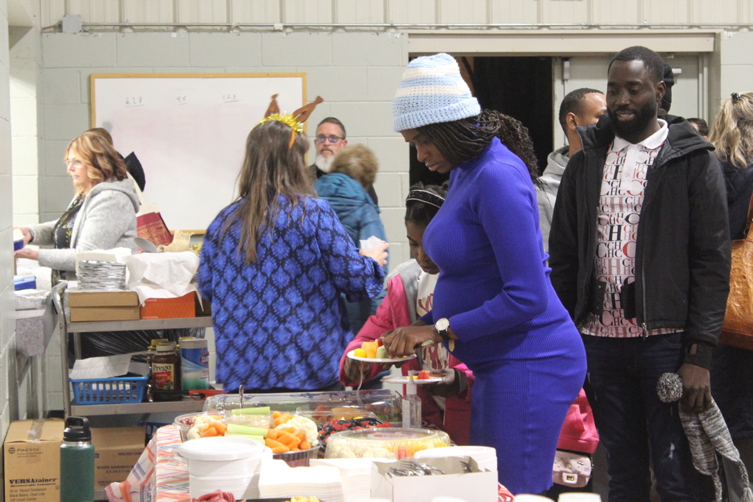 Northborough celebrates Thanksgiving with families from Haiti, Colombia