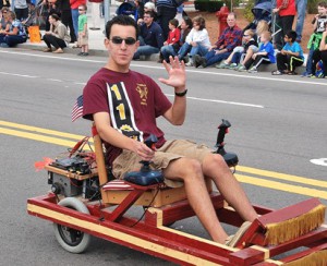 A member of the Algonquin Robotics Team cruises along the parade route. Photo/Ed Karvoski Jr.