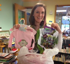 Laura Brennan, children's librarian at the Northborough Free Library, holds pajamas that were donated during the drive. Photo/submitted