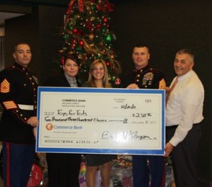 Commerce Bank donates to Toys for Tots
