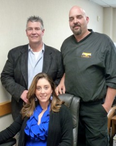 Peter Ferraro, left, general manager of Al's Oil, and Dave Lambert, service manager, with Katelynn Roy, customer service representative, seated. Photo by Nancy Brumback