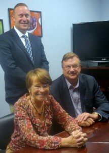 Rosemarie and John Boyd, seated, and Peter Boyd, standing, of Boyd Financial Strategies Photo/Nancy Brumback 