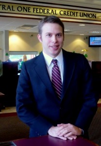 Zachary Daniels, marketing manager, in the main branch of Central One Federal Credit Union in Shrewsbury (Photo/Nancy Brumback)