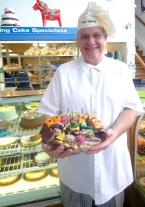 Jon Lundstrom with a pastry tray from Crown Bakery Photo/Nancy Brumback 