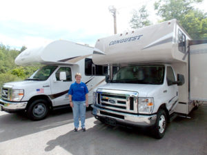Sheri Fuller with two RVs from the fleet. Photo/Valerie Franchi.