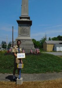 Boy Scout Carter Brannon at site of Civil War Memorial installing a historical marker for his Eagle Scout project.