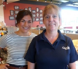 Jana Baseel, left, regional marketing specialist, (in striped top), and Susan Norton, right, general manager of Qdoba's new restaurant in Northborough. Photo/Nancy Brumback