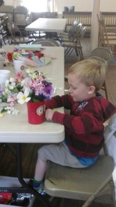 Dax Ziton working on this May basket at the Northborough Historical Society, Children's Day, May 3.