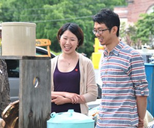 Carolyn Tay and Deckson Lee check out a vendor’s antiques.