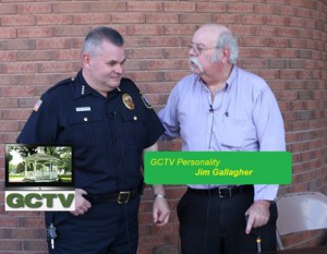 Grafton Community Television's Jim Gallagher interviews Grafton Police Chief Normand A. Crepeau Jr. at the 2013 Grafton National Night Out. (Photo/submitted)